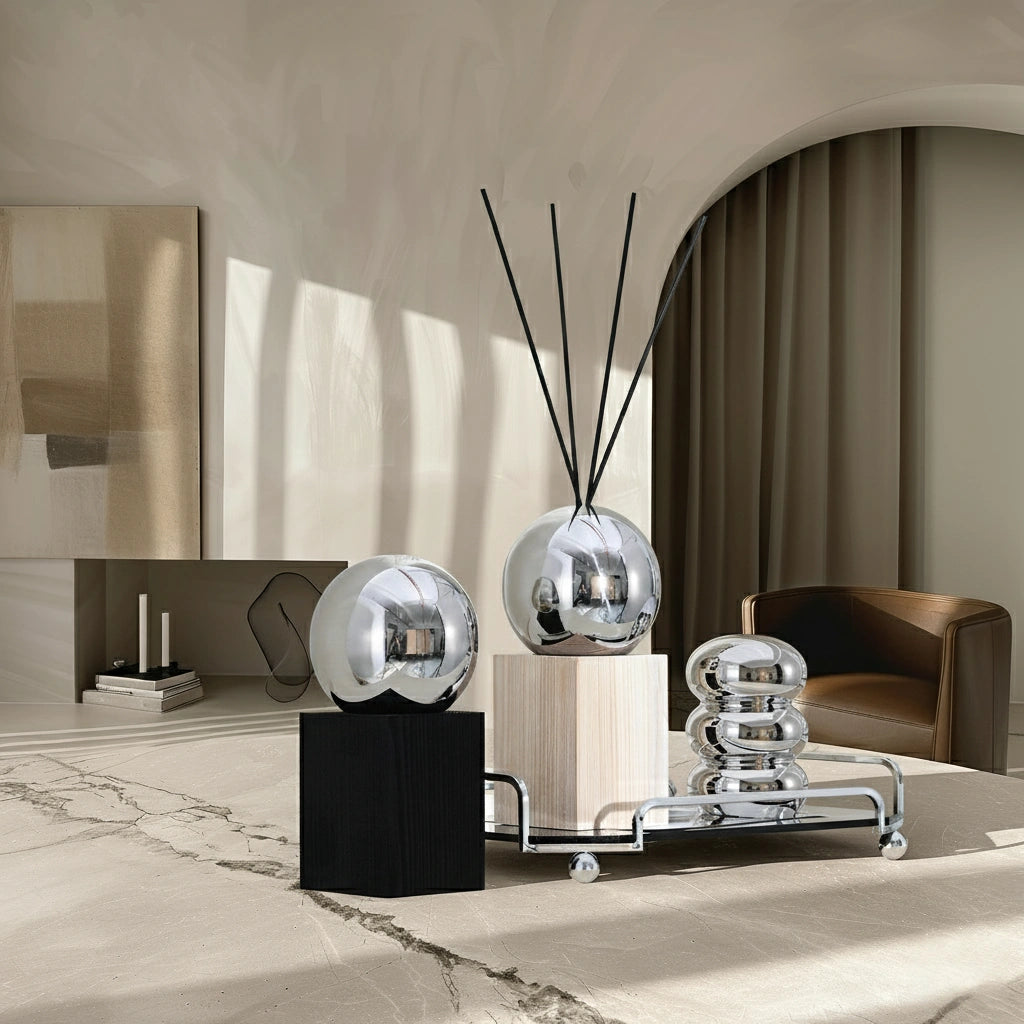Side-by-side comparison of black and natural wood refillable diffuser bottles for your home style