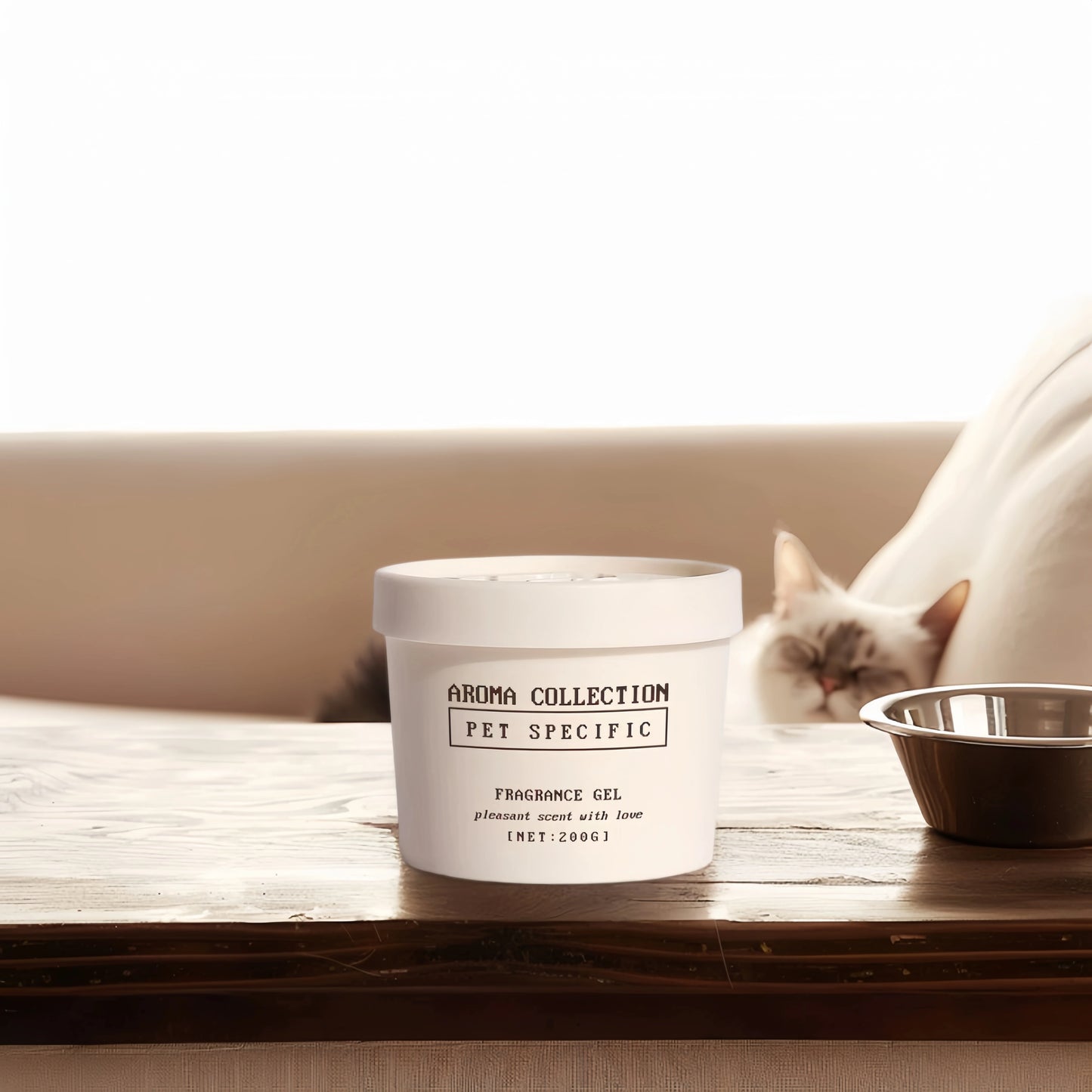 A cat relaxing peacefully near the Vanilla scented pet odor eliminator gel in a cozy bedroom setting.