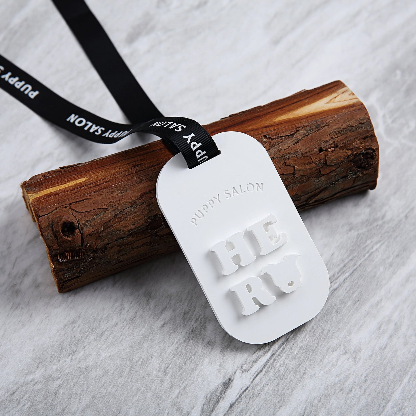 Puppy Salon scent tablets arranged elegantly on a marble surface, demonstrating their use as a stylish decor item while freshening the air.