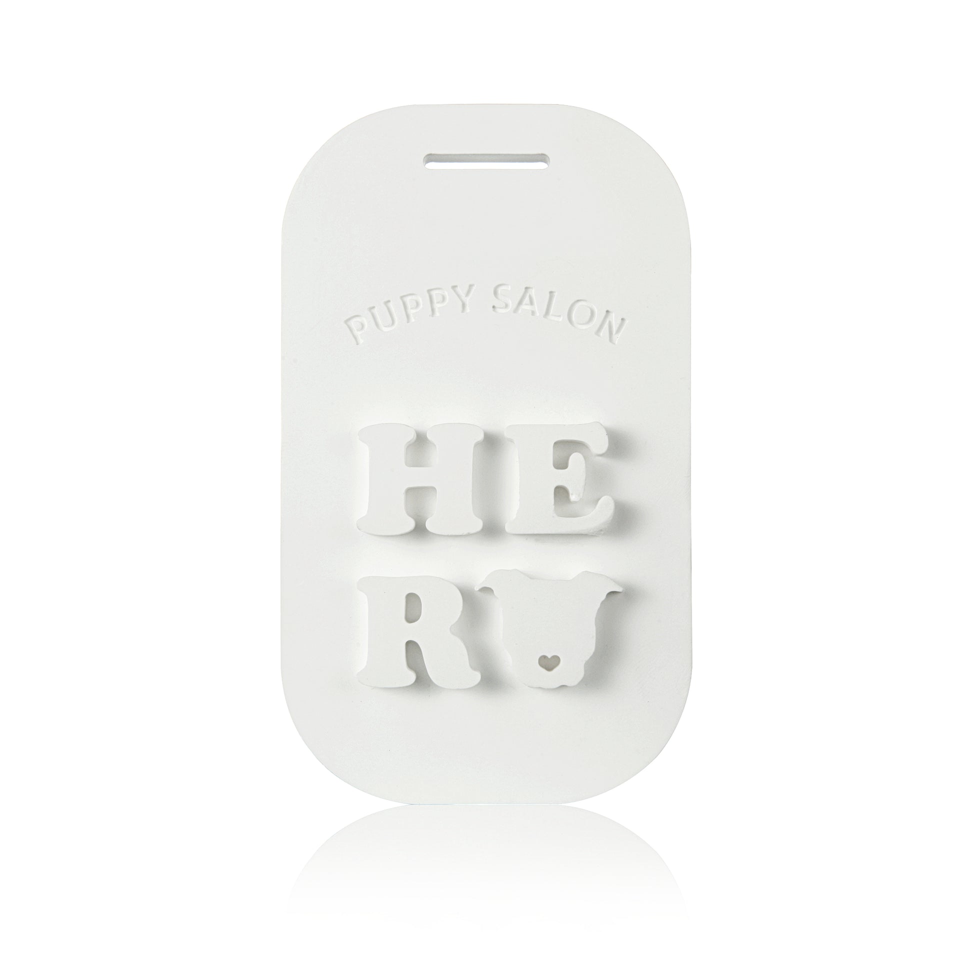 Close-up of a single Puppy Salon scented tablet. This long-lasting solid fragrance tablet is designed to eliminate odors in small spaces.