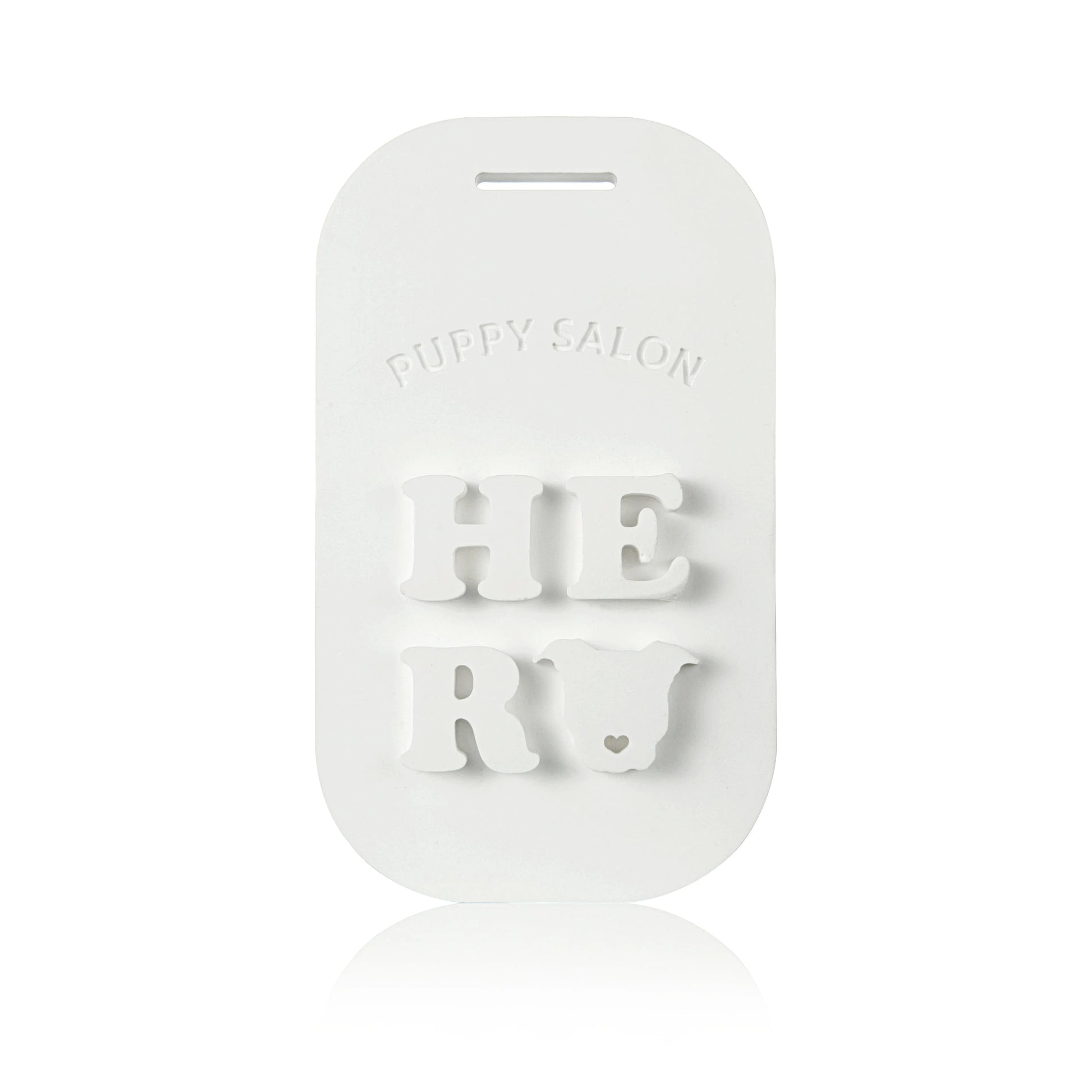 Close-up of a single Puppy Salon scented tablet. This long-lasting solid fragrance tablet is designed to eliminate odors in small spaces.