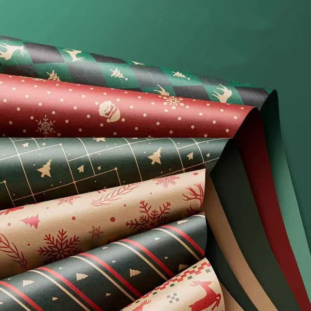 A collection of different holiday wrapping paper designs, showing the variety of patterns available.
