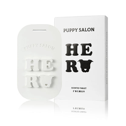 The Puppy Salon Hero Scent tablet set, showing the tablets alongside their stylish storage box, perfect for freshening drawers and closets.