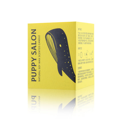 The elegant yellow gift box for the Puppy Salon whale-inspired candle, perfect for gifting.