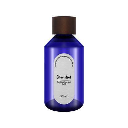 Bottle of Nutmeg Freesia reed diffuser refill oil. Long-lasting fragrance for refreshing your home.